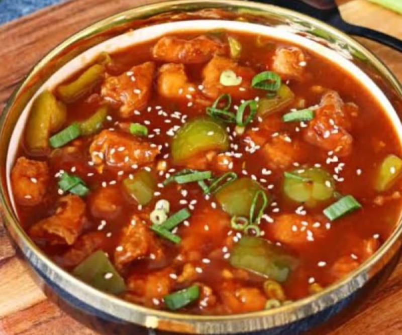 Chicken karahi cooked in traditional wok